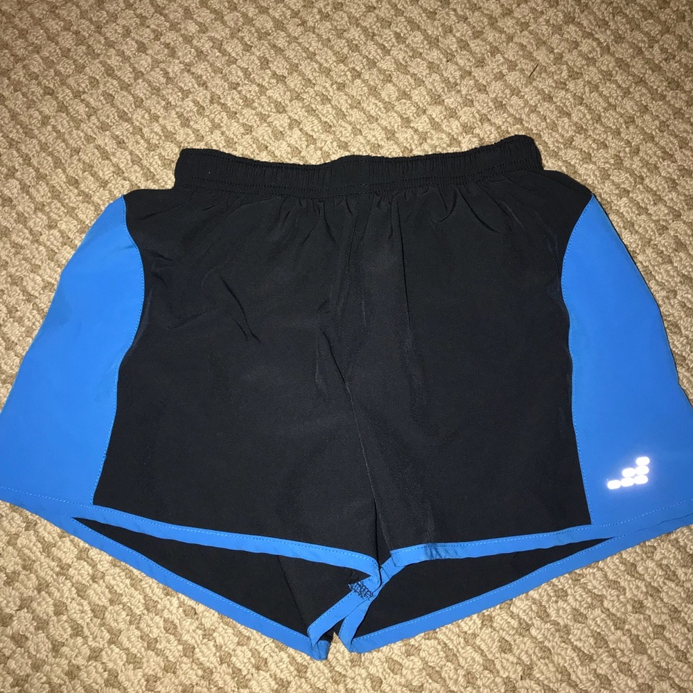 Black and royal blue BCG athletic shorts.